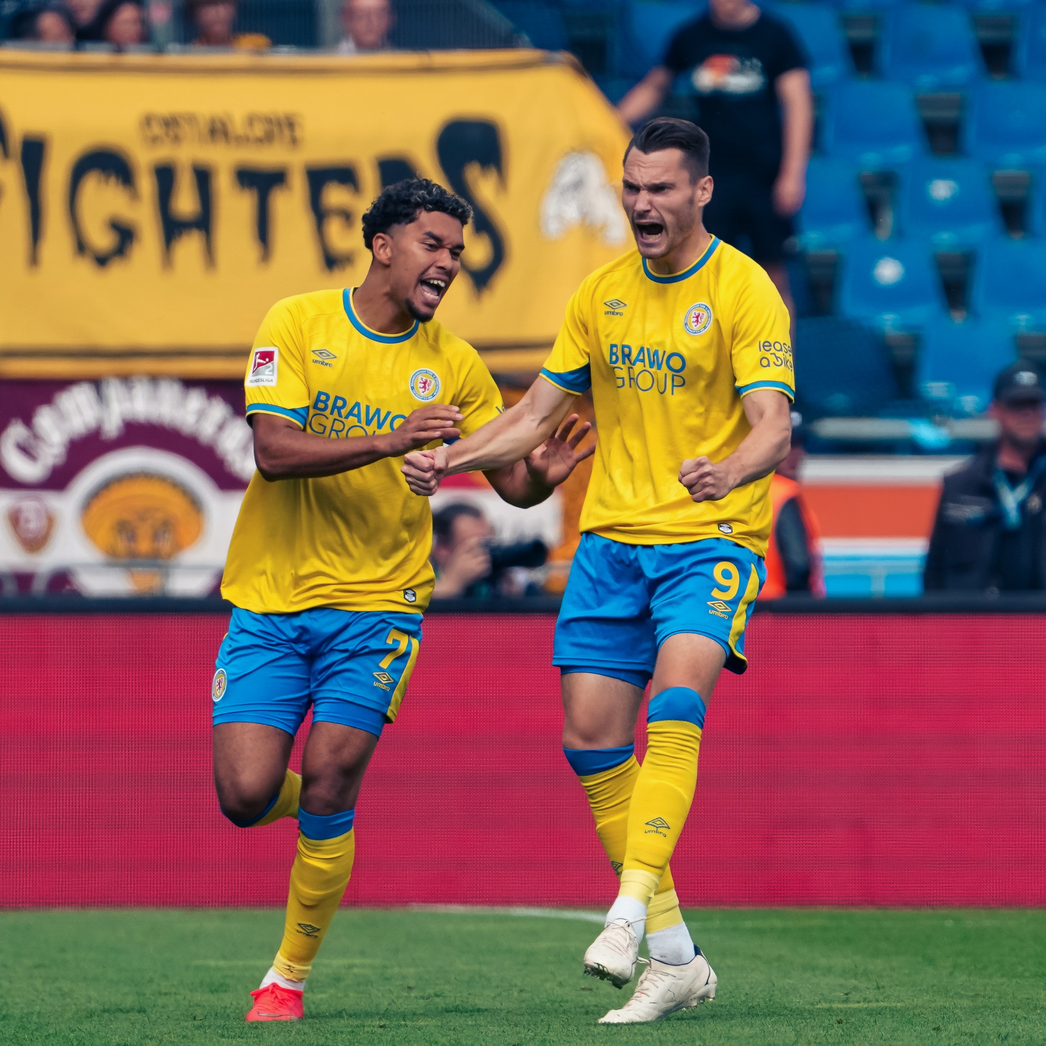 Eintracht Braunschweig players celebrate during the 2:2 draw with Dynamo Dresden at the Eintracht-Stadion.