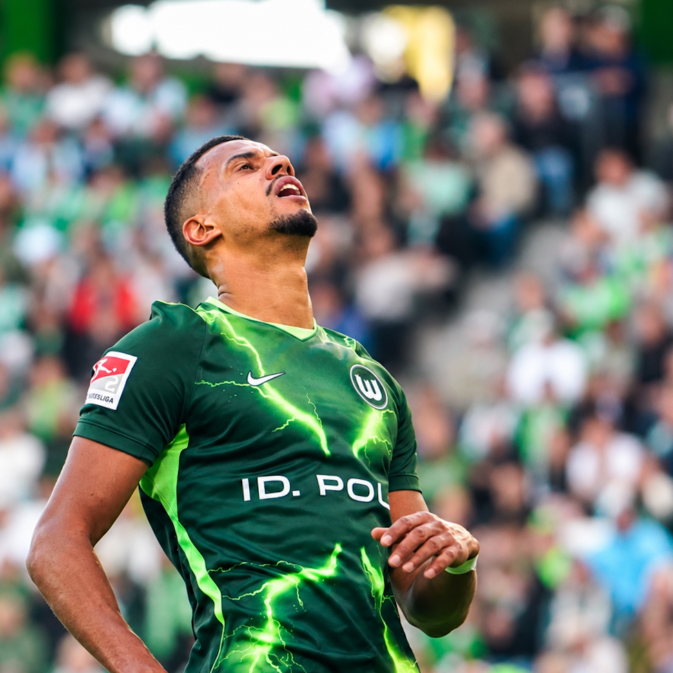 A VfL Wolfsburg player reacts during the dramatic 4:4 draw with Energie Cottbus at the Volkswagen Arena.